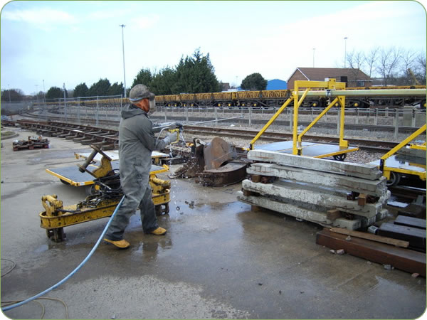 Concrete trimming using water blasting