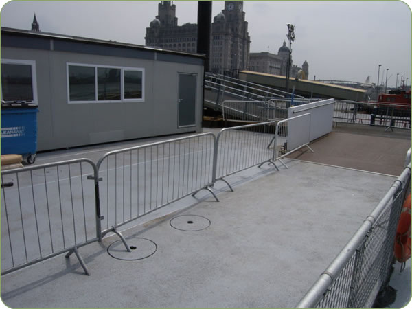 Water jetting to clean landing stage