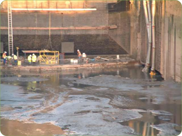 Water jetting used to clean dock gates